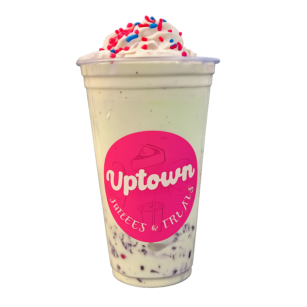 Cream dessert drink with sprinkles and whipped cream